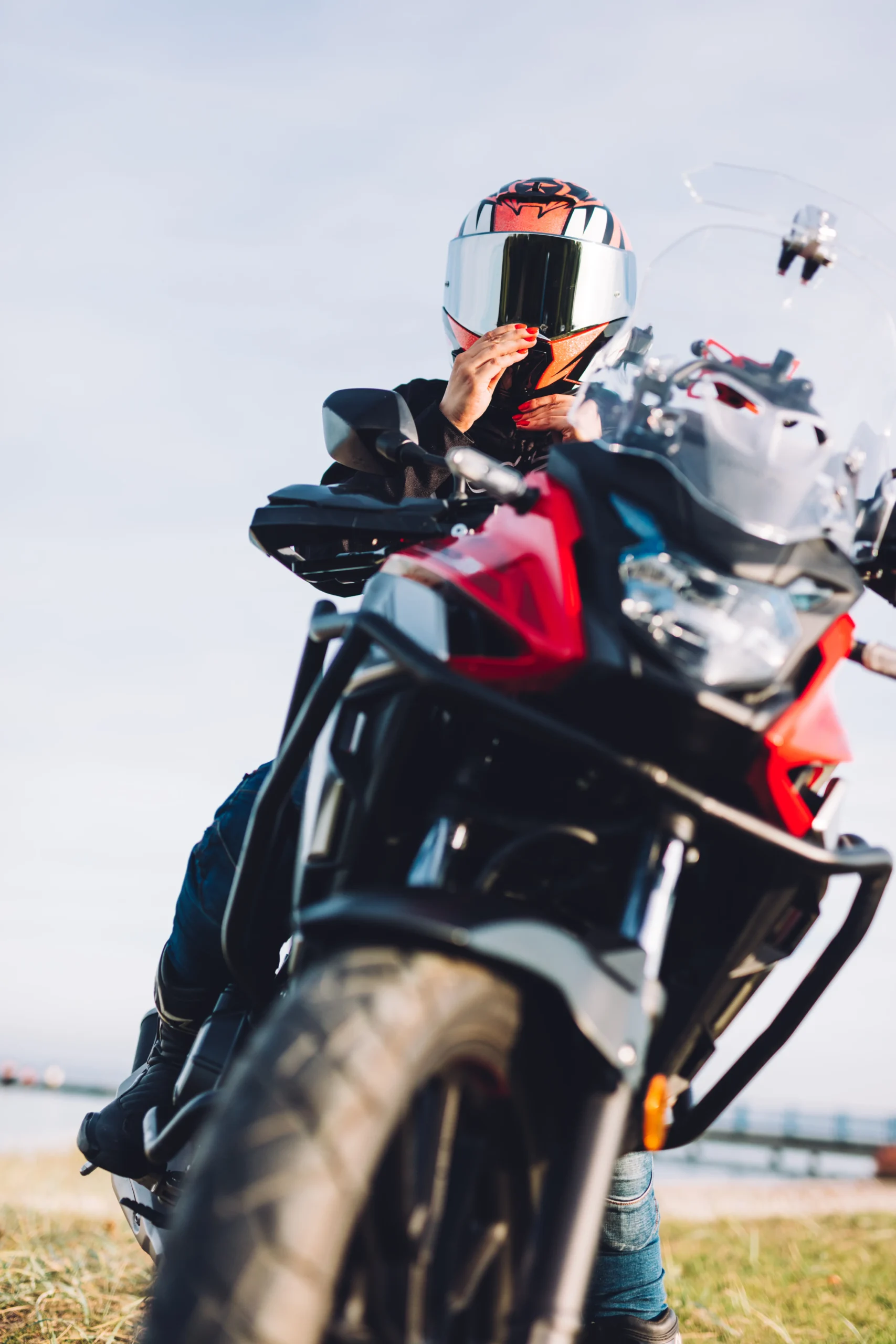 woman-on-a-motorbike-looking-at-the-ocean-view-ad-2025-03-25-21-18-46-utc