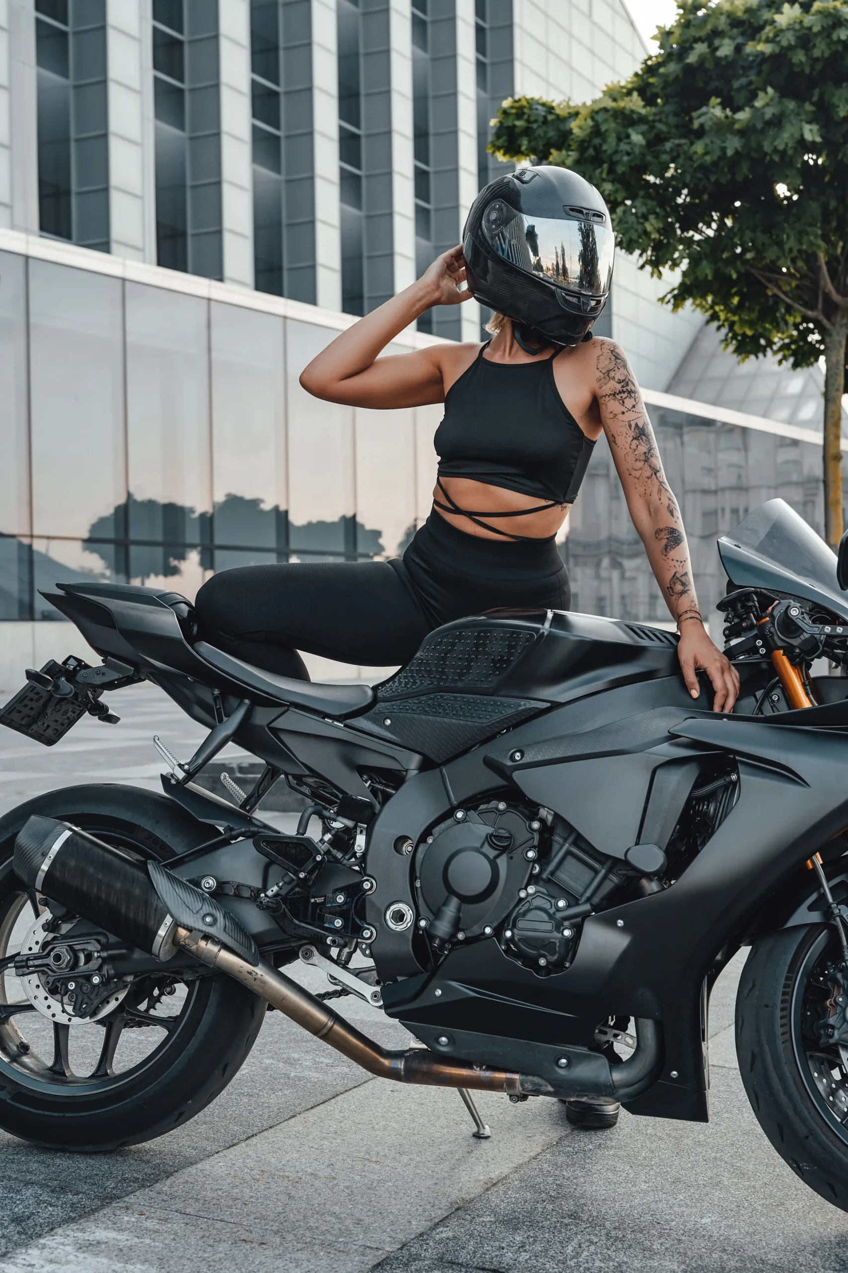 woman-with-helmet-posing-on-black-motorcycle-outdo-2025-01-25-04-17-37-utc