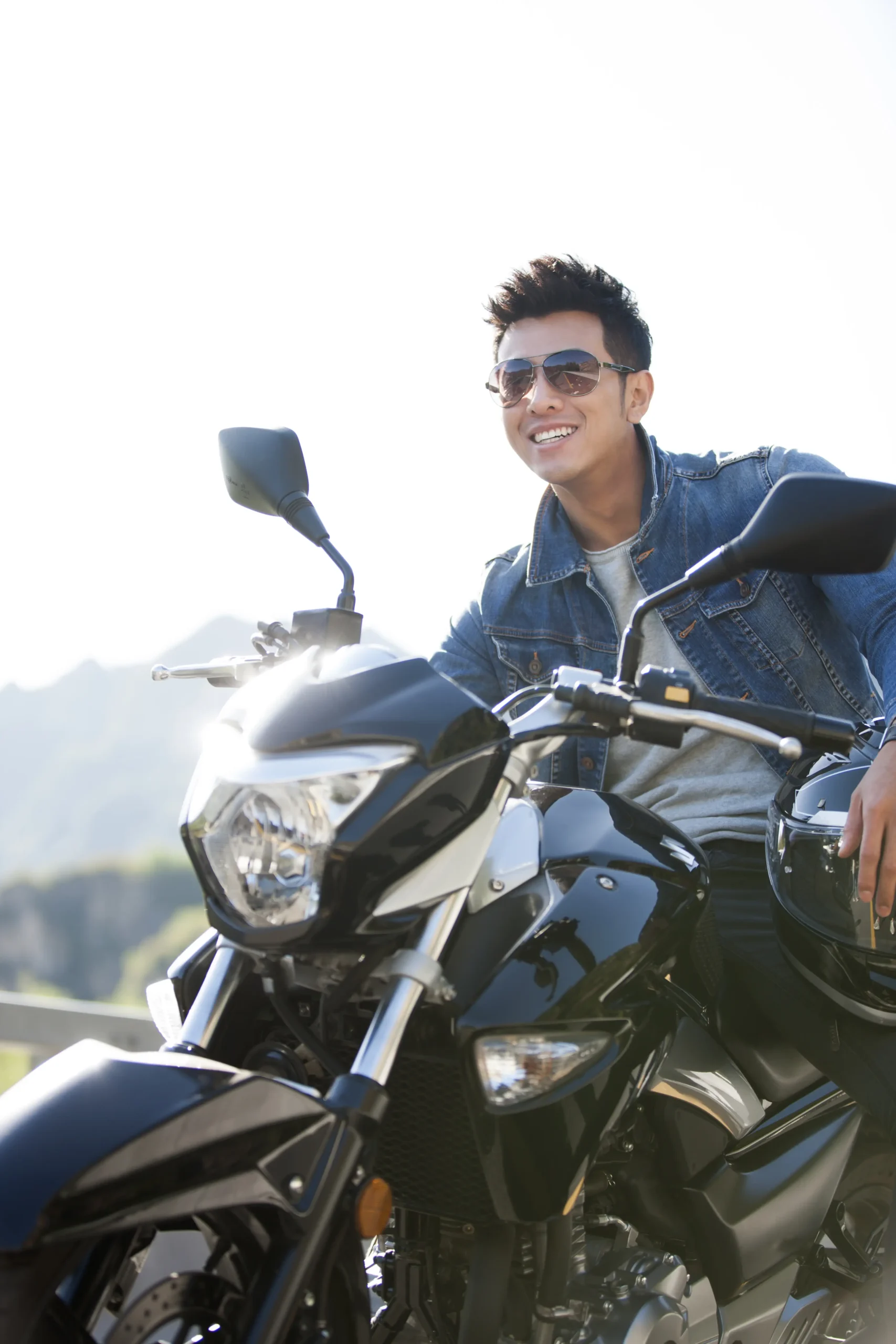 young-man-riding-motorcycle-2024-10-11-15-53-38-utc